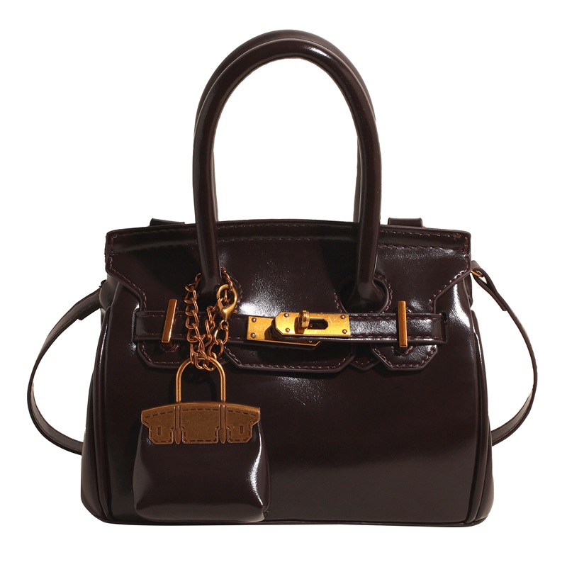 Bolso para mujeres 2025 nuevo cross-border multifuncional retro mochila de hombro nicho bolso de oro de lujo ligero