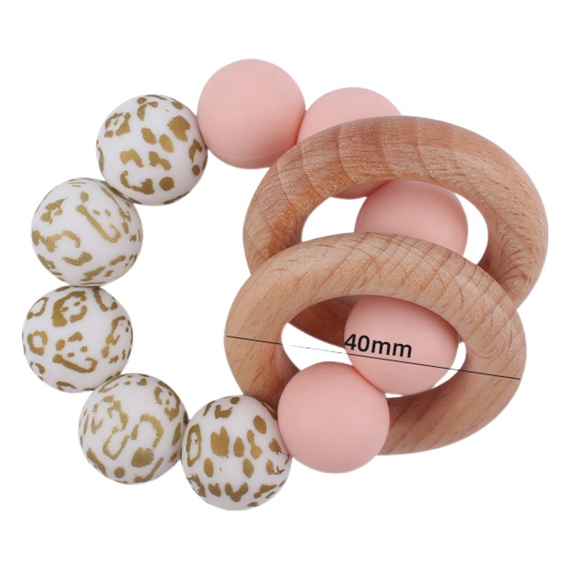 Nuevo bebé suministros de silicona leopardo cuentas mordedor pulsera calmante bebé DIY mordedura de silicona juguete de haya