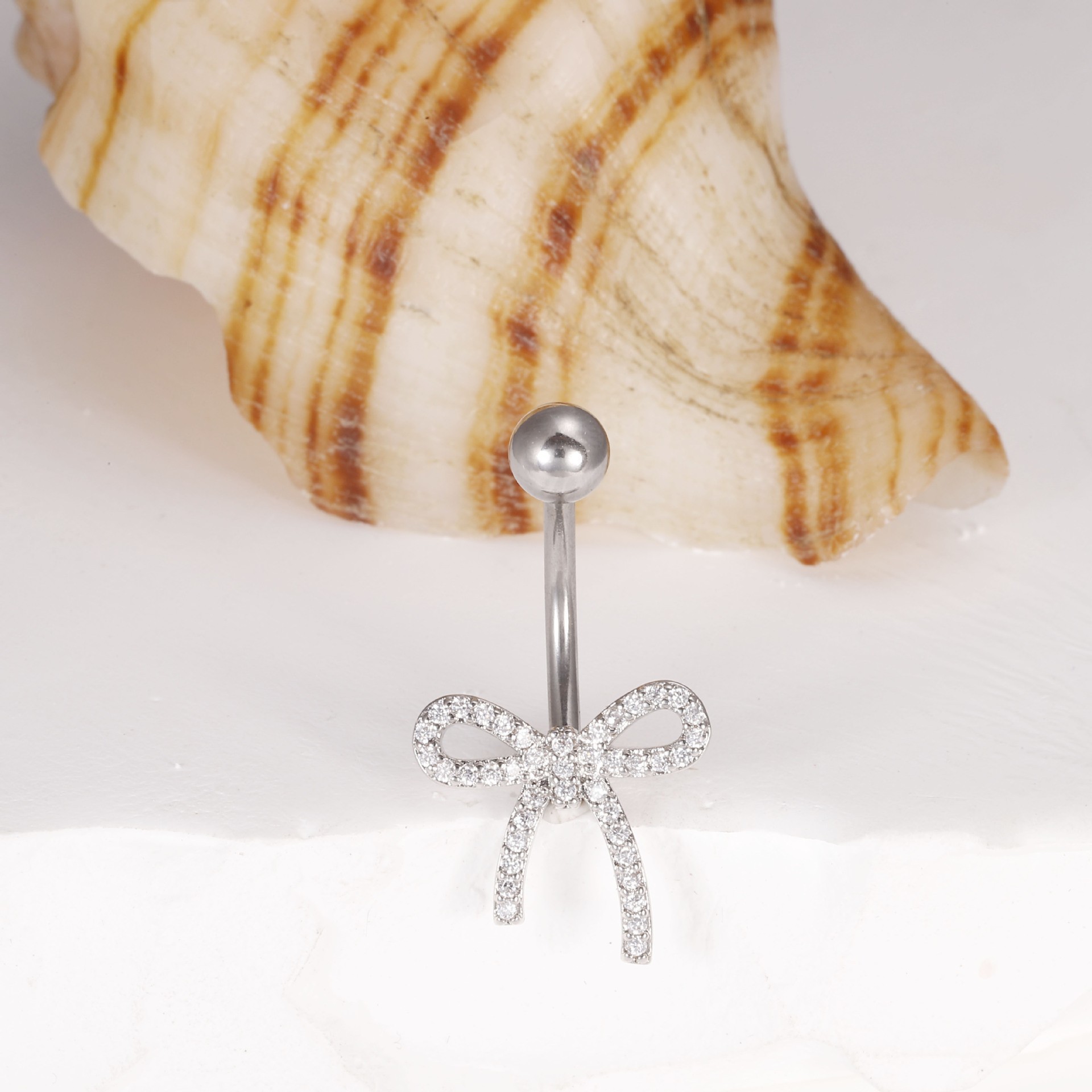 Silver pointed spike labret stud material detail
