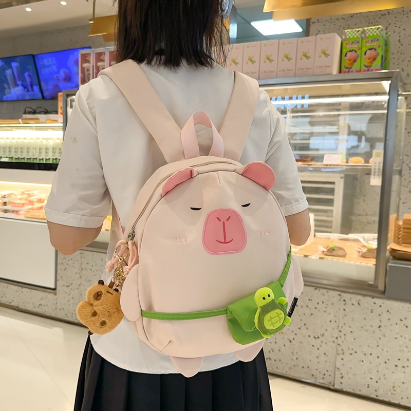 Mochila japonesa encantadora de dibujos animados 2024 nueva extraña mochila de muñeca de gran capacidad de muñeca de estudiantes