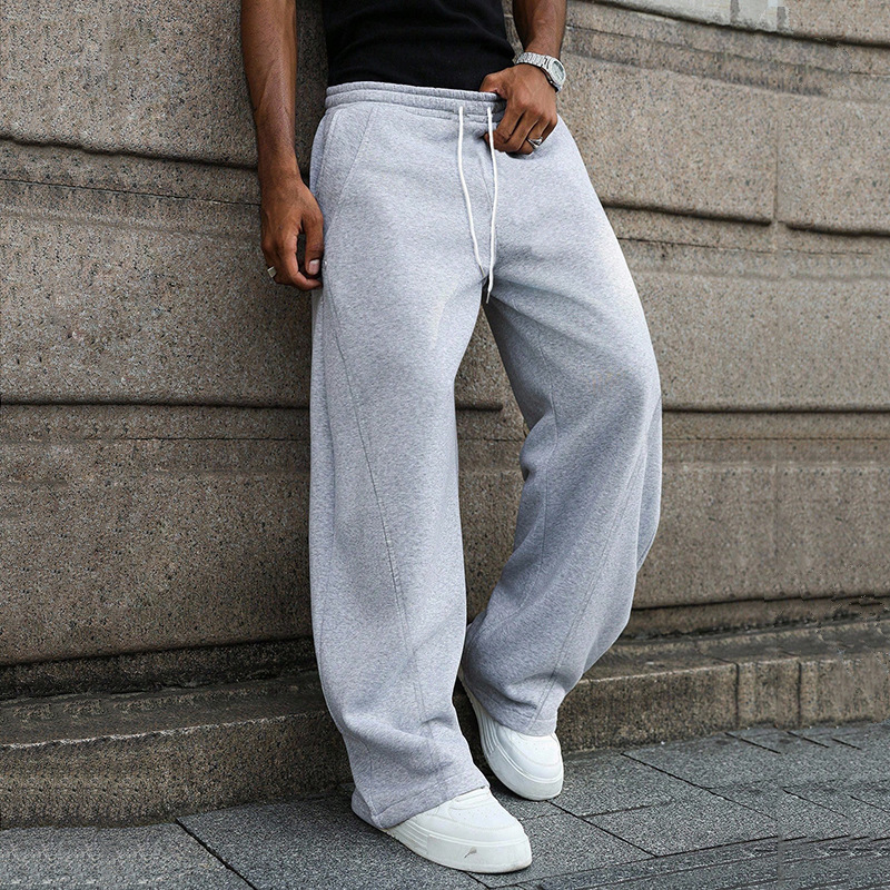Comercio exterior transfronterizo Europa y América ropa de hombre Amazon para aliexpress cuerdas de dibujo sueltas pantalones de cuchillo de abrigo de tamaño grande en stock