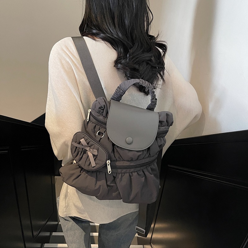 Mochila transfronteriza 2025, nueva moda coreana dulce bolso de mano plegable estilo campus bolso de escuela secundaria