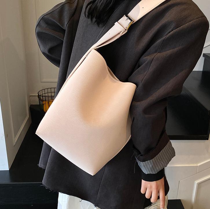 Nuevo bolso de cubo simple retro transfronterizo para mujer, estilo popular y explosivo, bolso de mensajero de un solo hombro de nicho casual