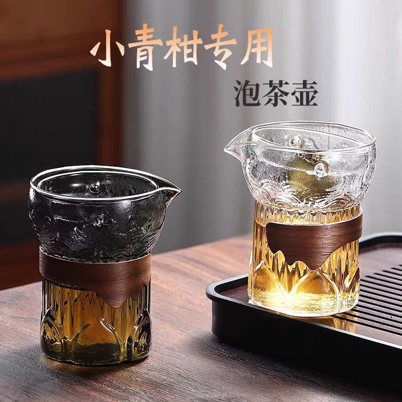 Xiaoqing mandarin special teapot creative 360-degree rotating glass filter liner tea separation brewing hand-held pot Xiaoqing mandarin special teapot creative 360-degree rotating glass filter liner tea separation brewing hand-held pot