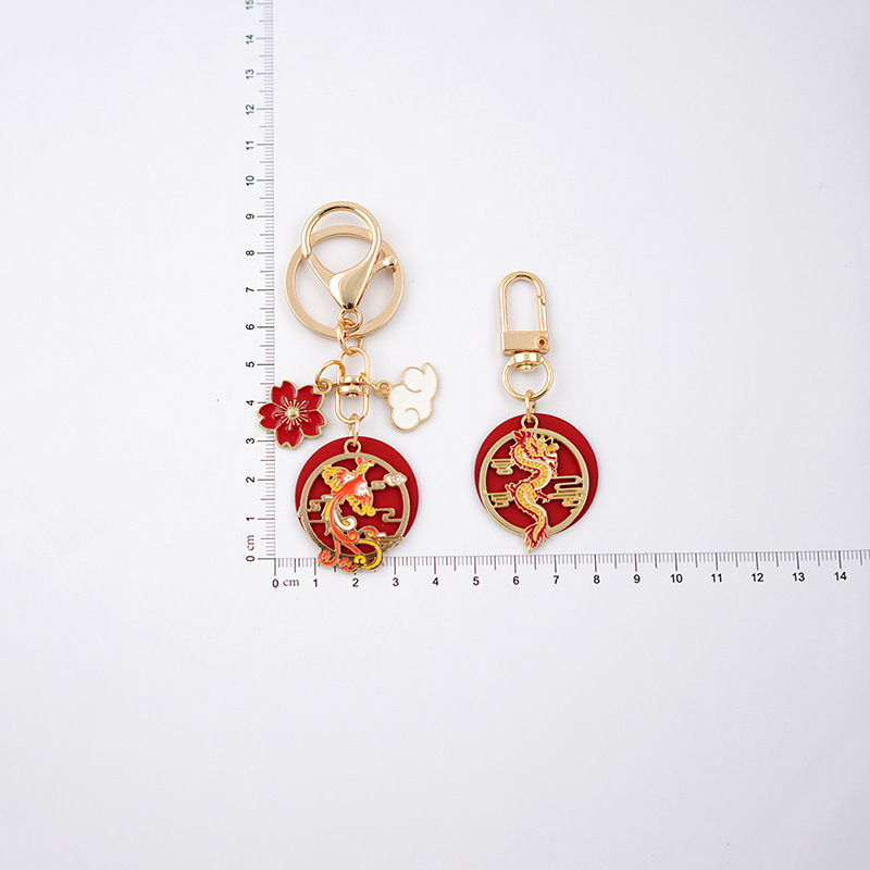 Tianyun Tengfei Dragon y Phoenix año llavero creativo lindo hombres y mujeres coche llavero aleación exquisita joyería en línea celebridad colgante