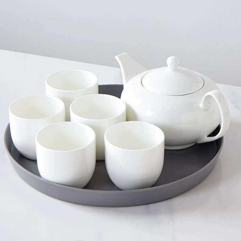 White teapot, capacious tea cup, summer tea set