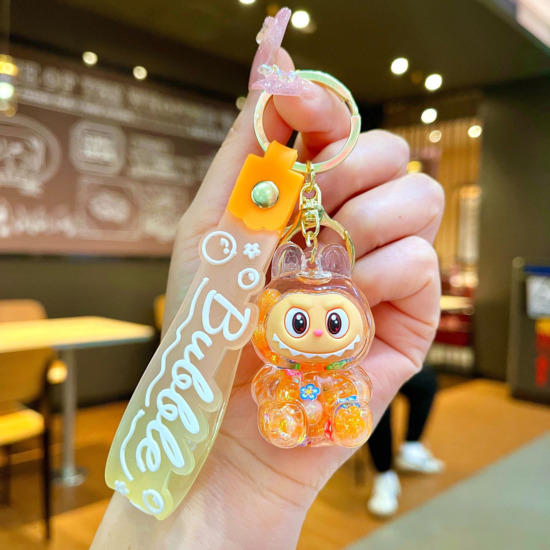 Llavero red acrílico con arena flotante