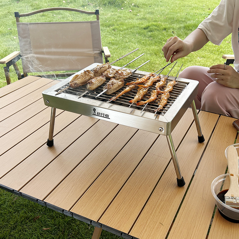 Parrilla portátil al aire libre acero inoxidable 304 horno de camping a la parrilla de carbón doméstico plegable barbacoa compra a granel