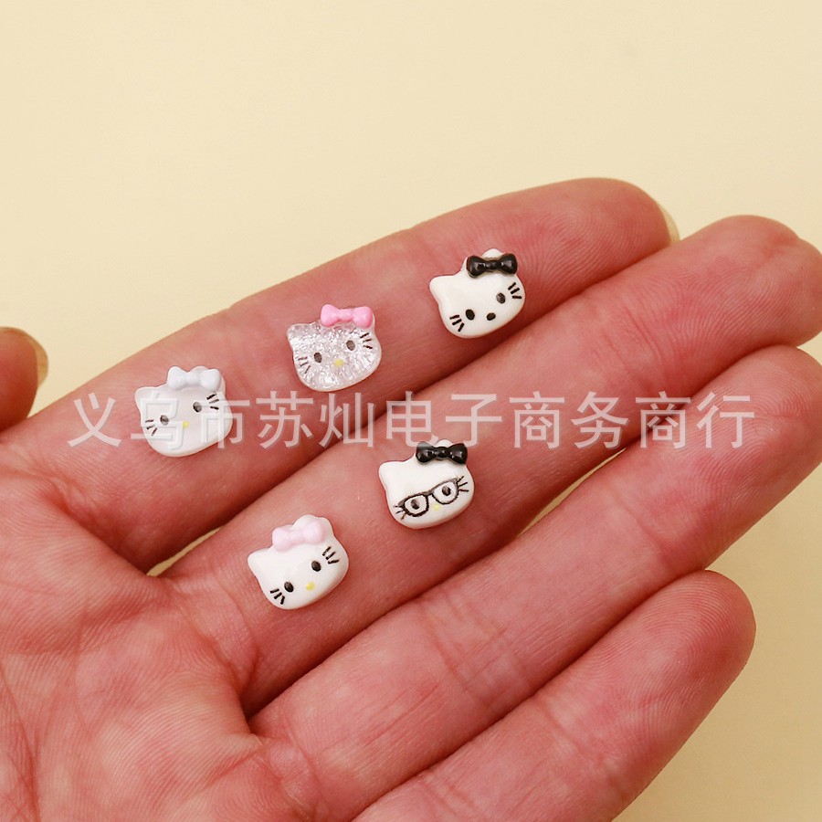 Nuevo hielo transparente resina tridimensional accesorios de dibujos animados uñas DIY crema pegamento caja del teléfono decoración gatito al por mayor KT gato
