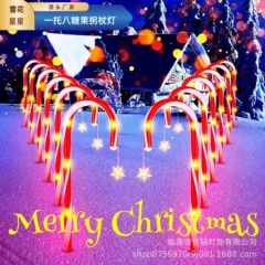 国境を越えた新製品の太陽エネルギーリモコンクリスマスライトはキャンディーの杖をつないでいる