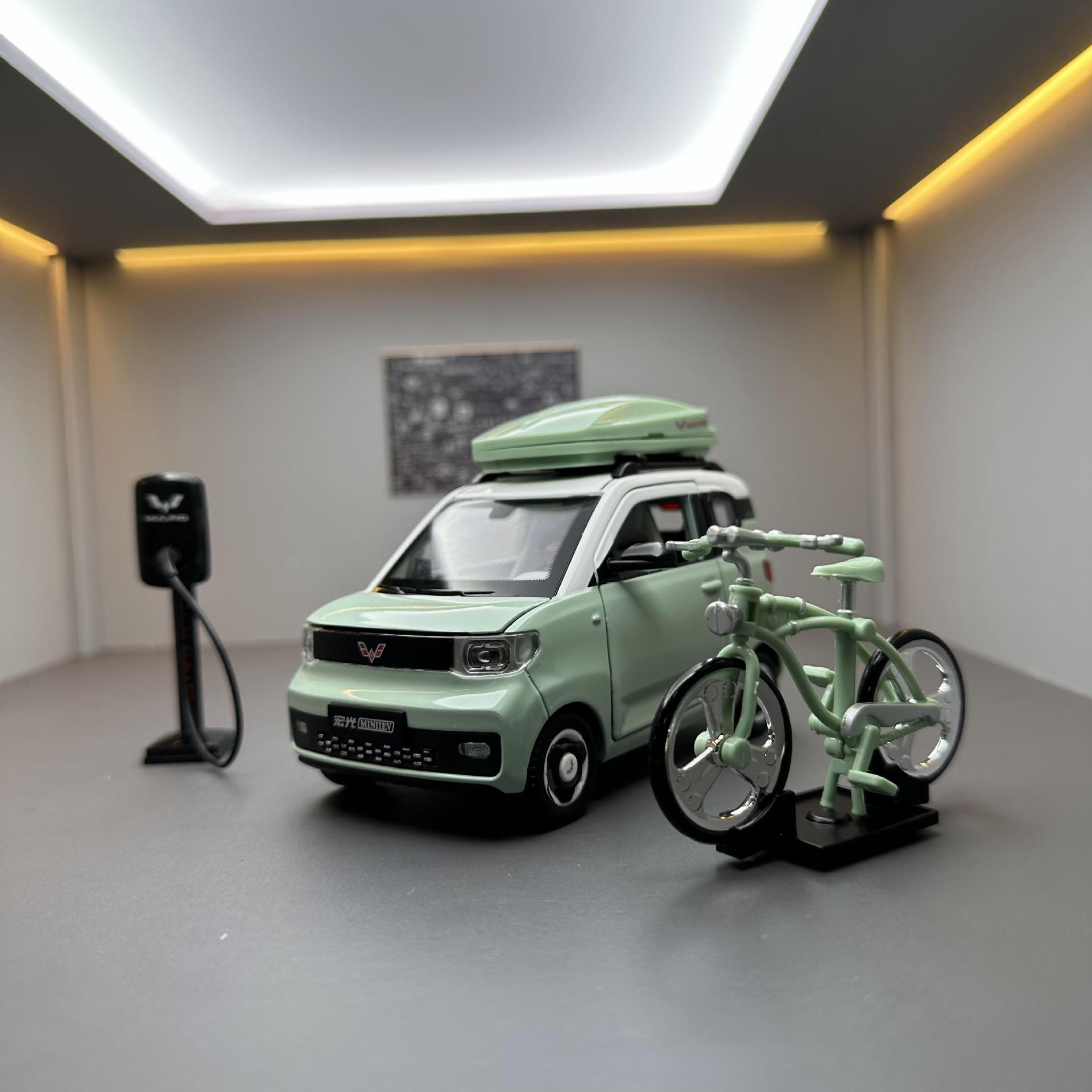 Modelo de coche de aleación de coche 1:24 Wuling Hongguang miniev Tire hacia atrás el sonido y la luz de cuatro puertas niño modelo de juguete adornos