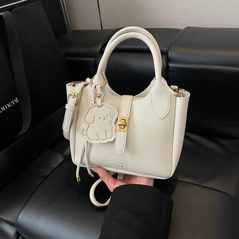 Bolsa de cubo portátil con patrón de lichi para mujer 2025 nueva moda urbana