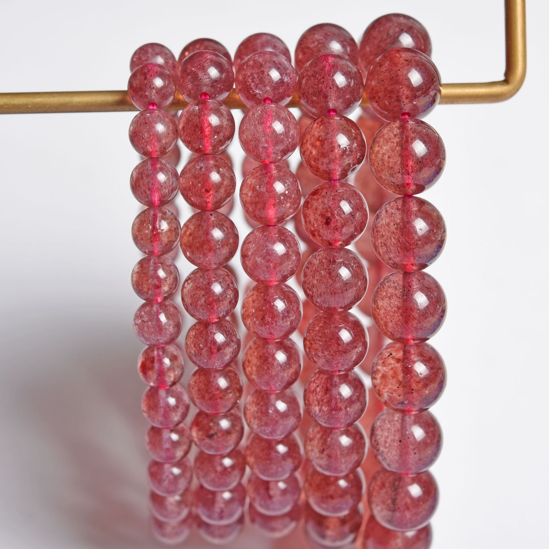 智贝详情图_5富宏珠宝厂家6A深色红草莓晶天然草莓晶手链手串