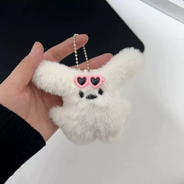 Розовый щенок в очках