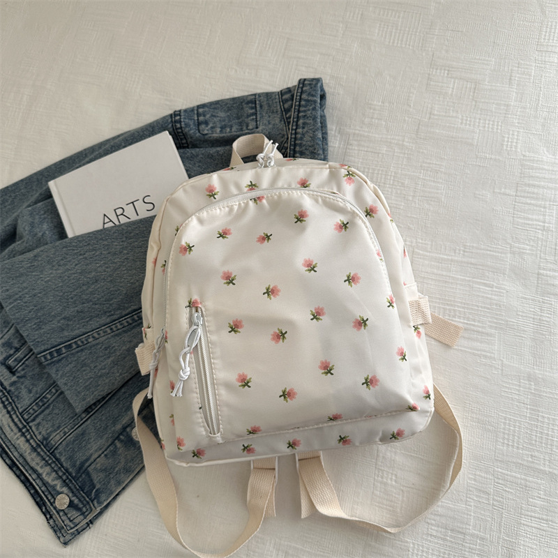2025 primavera nueva moda coreana simple mochila de hombro casuales flores frescas lindas dulces mochila de estudiantes