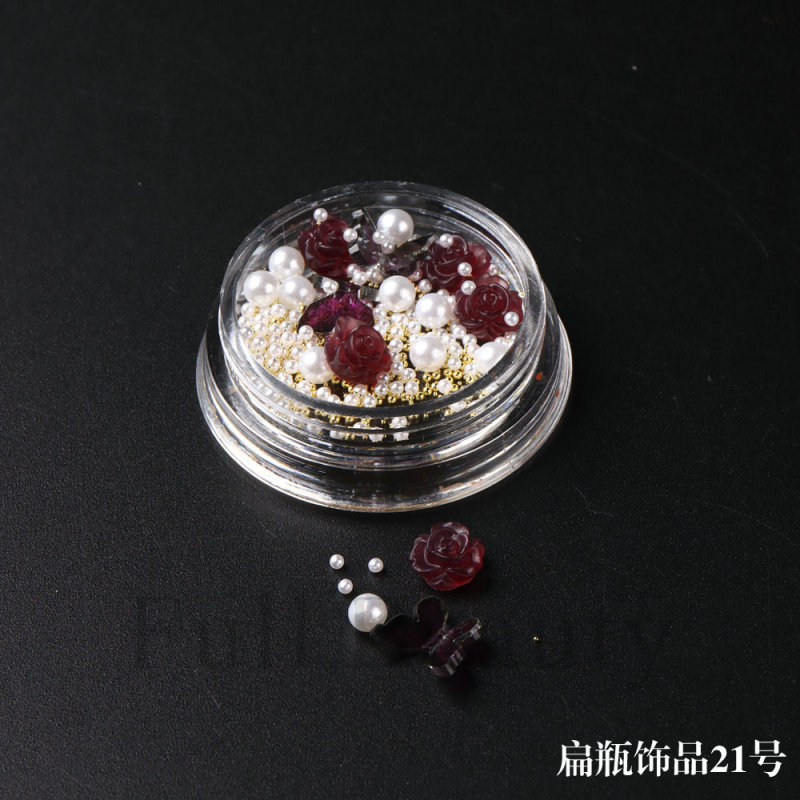 新商品のネイルアクセサリーは日本の平瓶の赤いツバキの花の蝶の真珠の鋼の玉を混ぜて爪のアクセサリーのnailを詰めます。|undefined