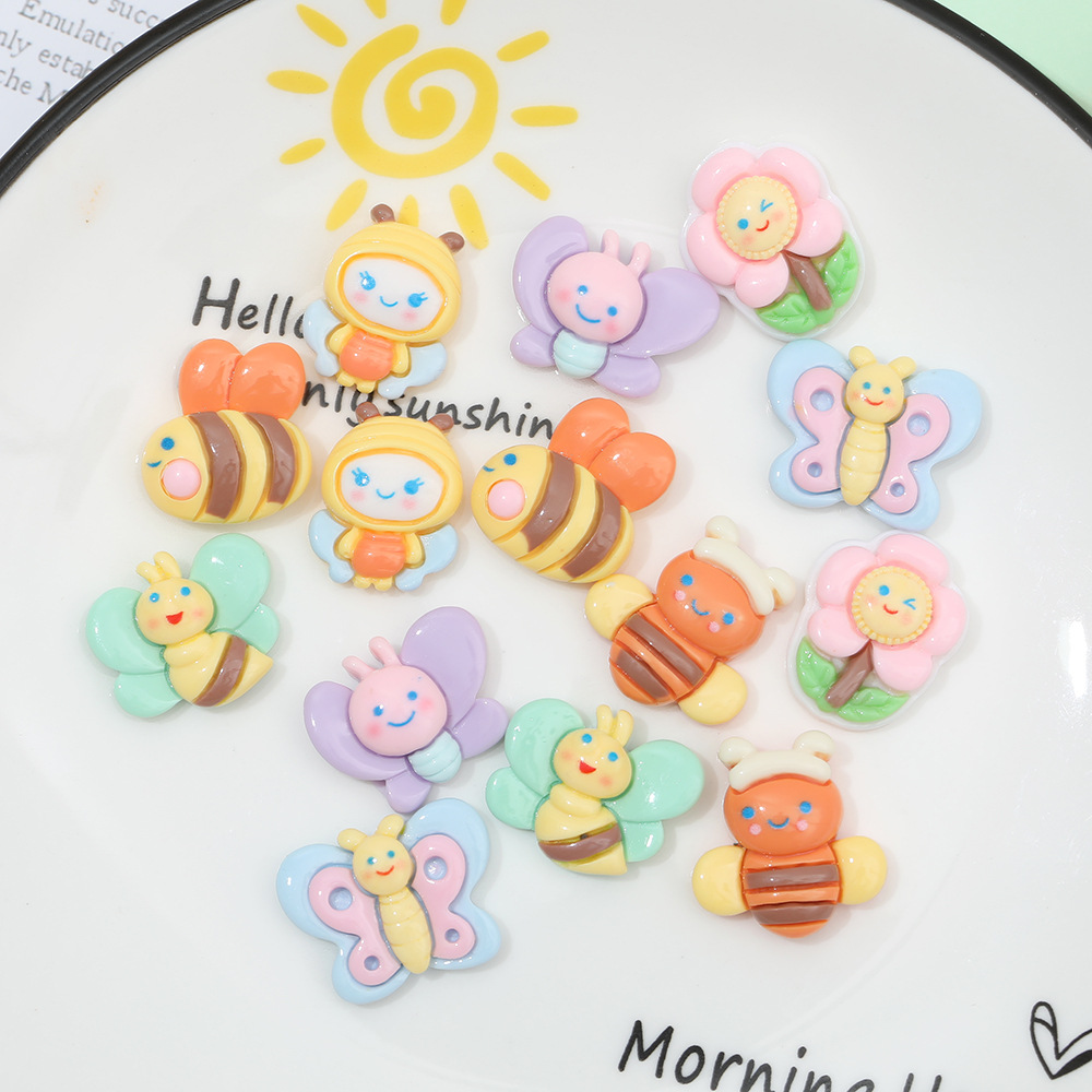 Macaron color pastoral abeja mariposa resina accesorios DIY crema pegamento accesorios para el cabello teléfono móvil Shell accesorios hechos a mano al por mayor