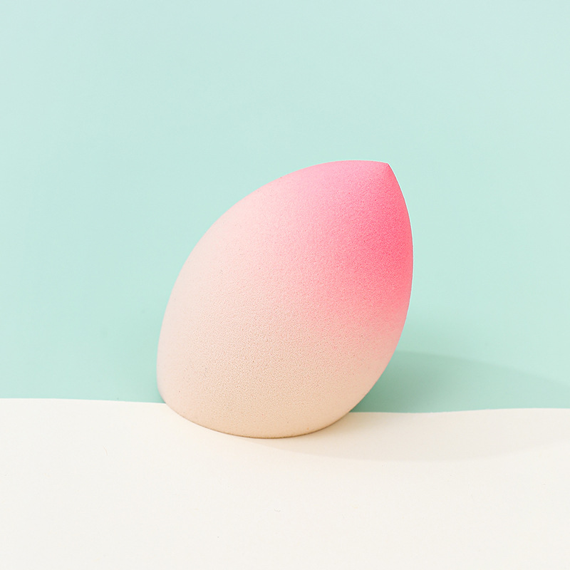 Fábrica personalizada de color degradado transfronterizo maquillaje de belleza soplo de huevo no come polvo no látex color spray gota de agua esponja de maquillaje de calabaza