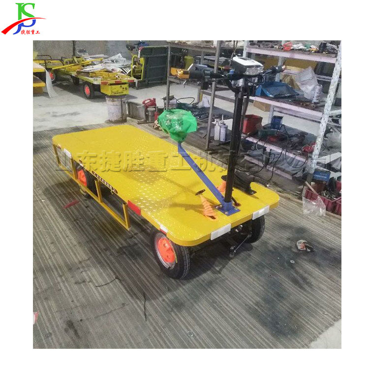 Camión plano eléctrico de cuatro ruedas de construcción ferroviaria urbana y rural camión tipo coche eléctrico hacia adelante y hacia atrás