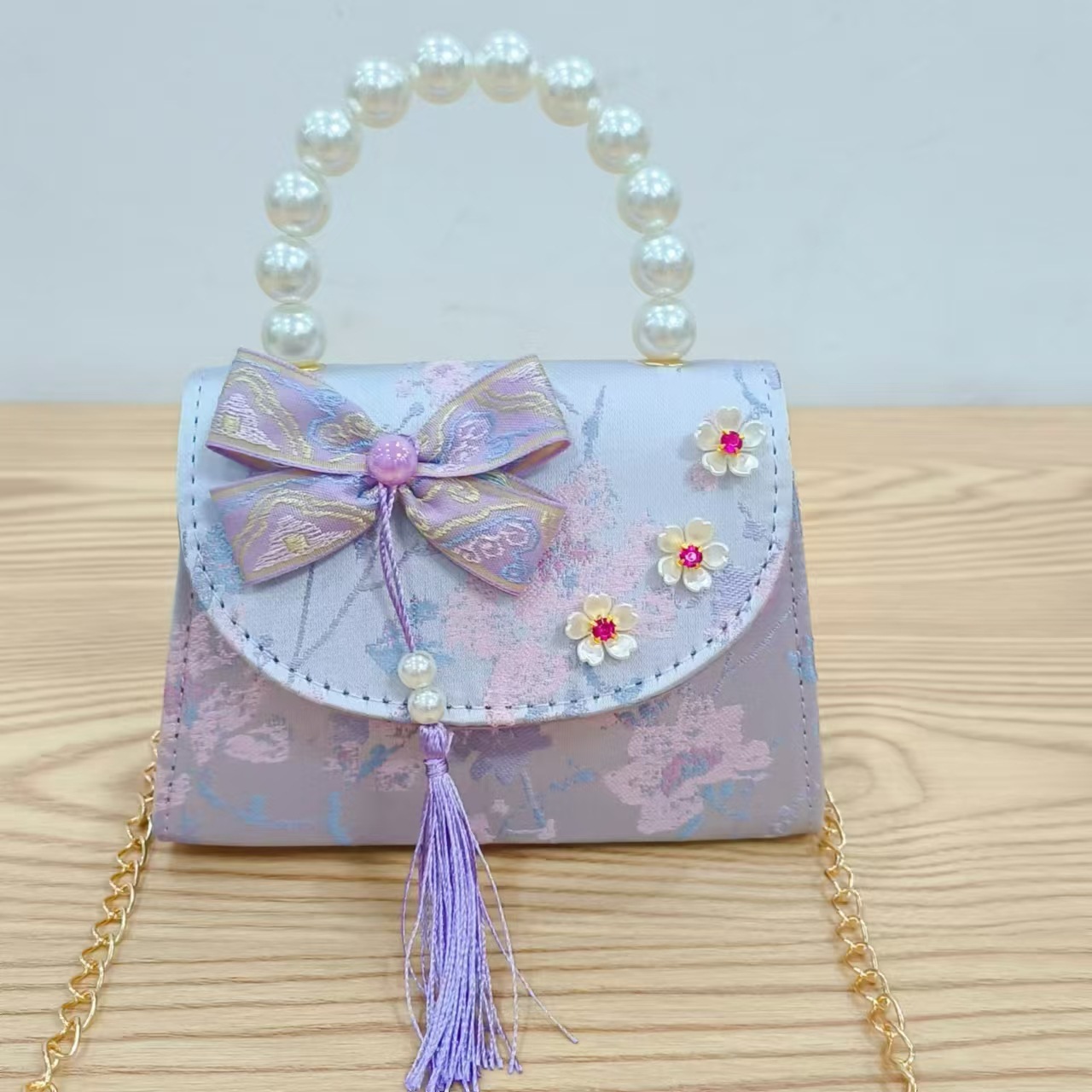 Bolsas de niños arco de estilo chino bordilla accesorios de niñas bolsas de mano princesa de perlas bolsa de cambio