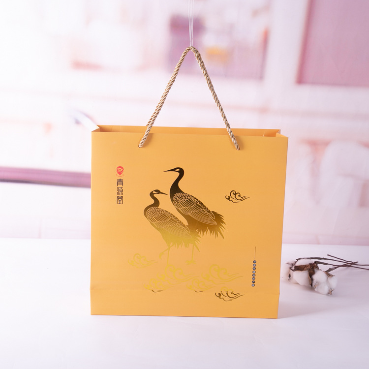 厂家直供牛皮纸袋礼品手提酒袋 服装店购物袋手拎包装袋子