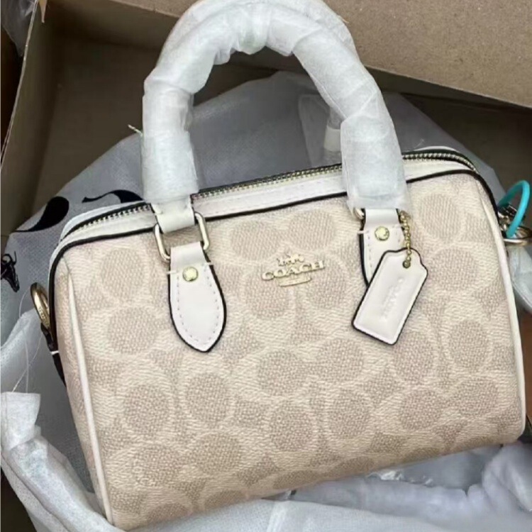 2026 Classic Rowan Boston Mini Pillow Bag, a fashionable and versatile handbag that can be carried by hand, worn as a shoulder bag, or slung across the body, designed for women