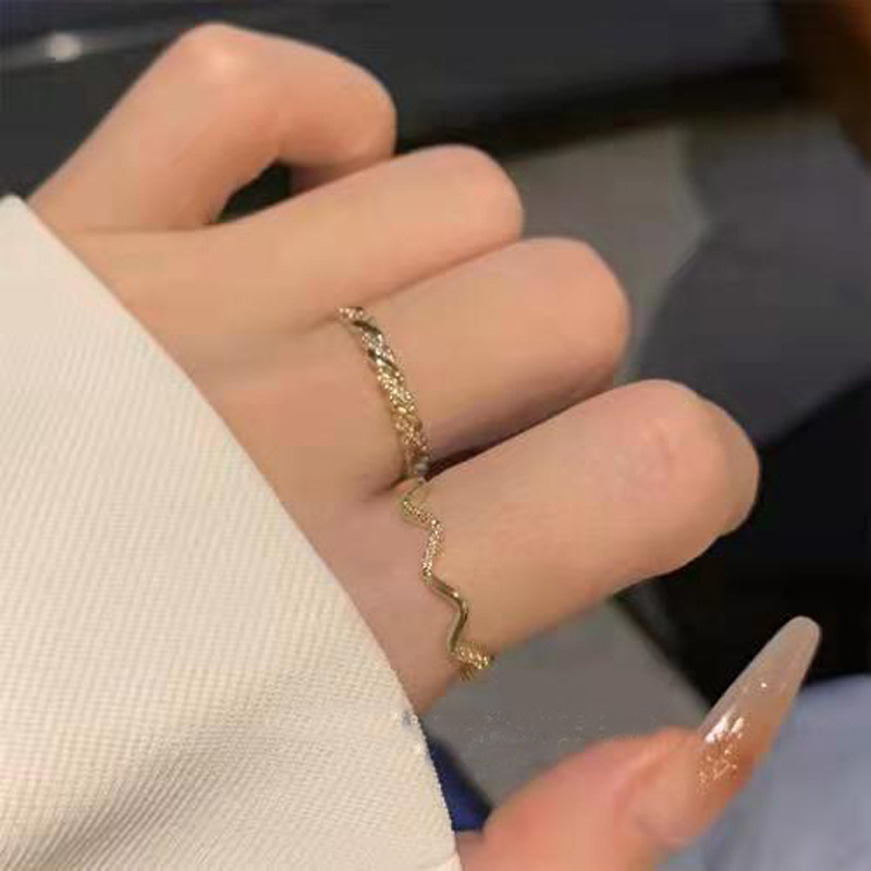 Geometric wavy brand design ring with pigtail