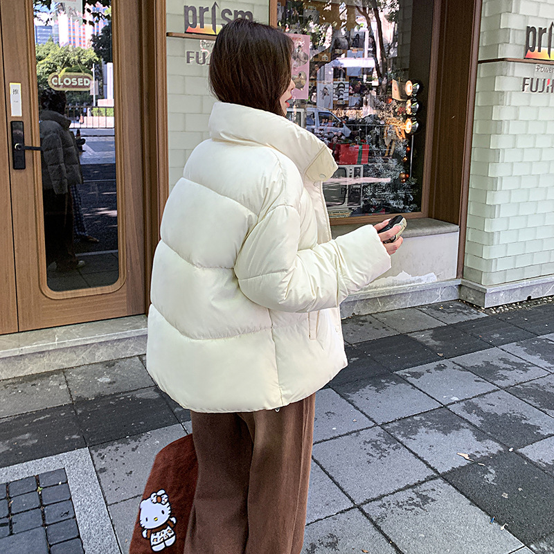 Chaqueta de algodón de pluma para mujeres, ropa de invierno coreana 2024, nuevo estilo universal, suelto, sensación de alta calidad, cuello de pie, ropa de pan gruesa