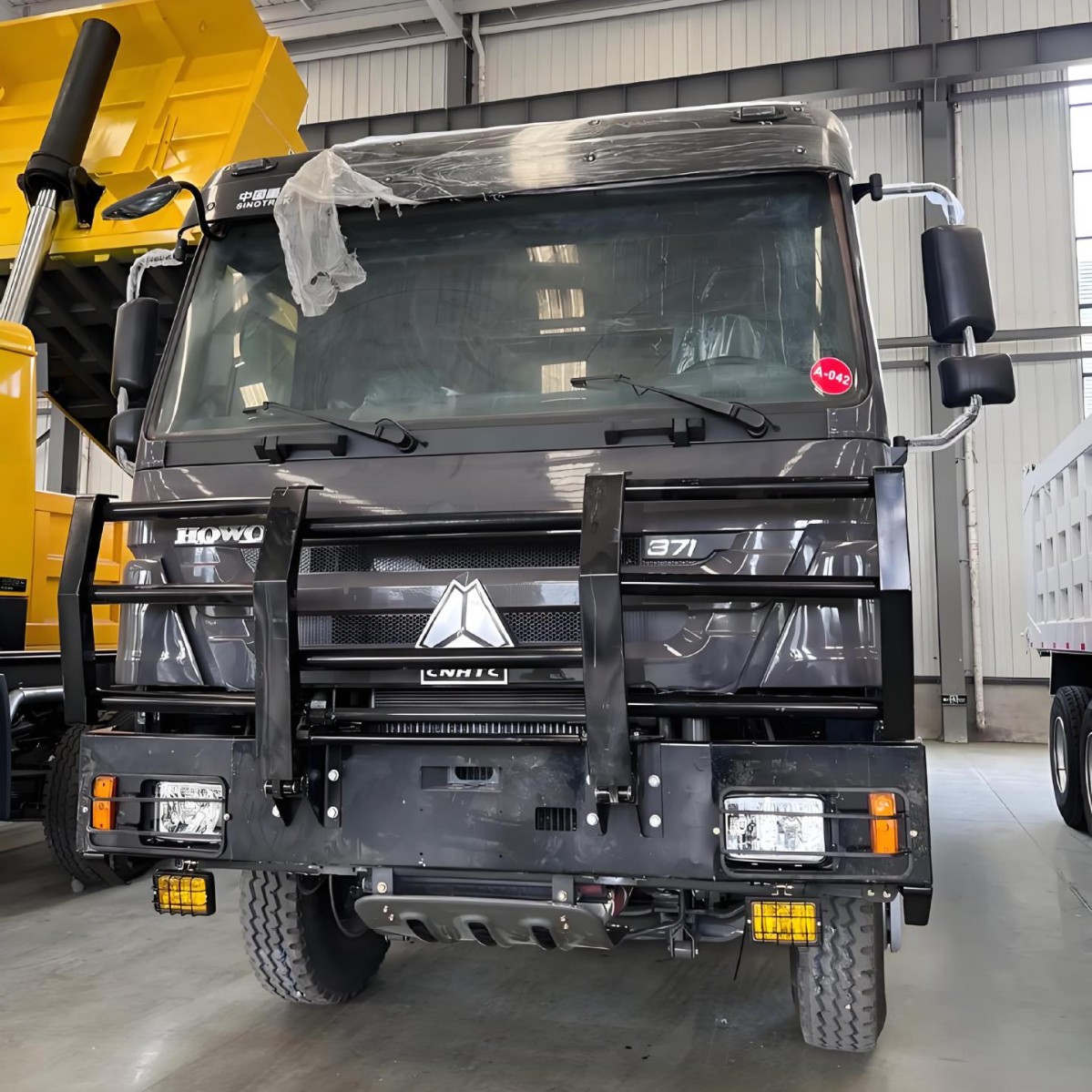 Foreign Trade Export Howo 8X4 Dump Truck with Reinforced Bumper Weichai Power Engineering Heavy-Duty Dump Truck