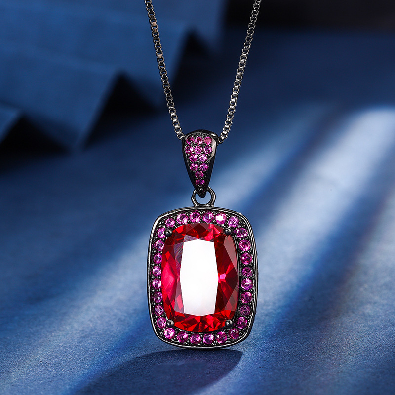 Zhuang Shengsheng Jewelry Fondo de cobre chapado en oro simulación corindón rojo cristal puntiagudo azul temperamento cuadrado gordo traje de oro negro mujer 10*14