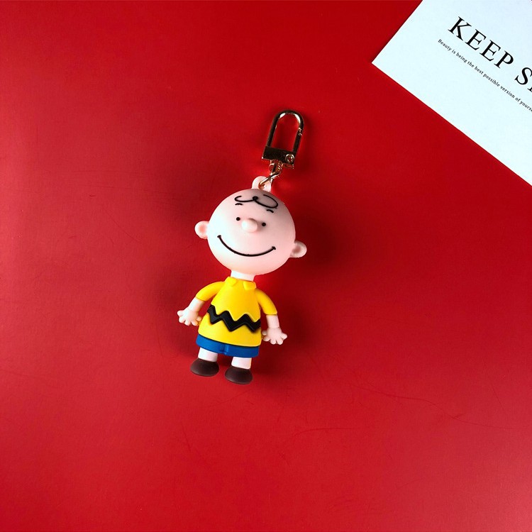 新商品の漫画のスヌーピーチャーリーのキーホルダーの自動車のキーチェーンのかわいい包みのペンダントのゴムのぬいぐるみの贈り物