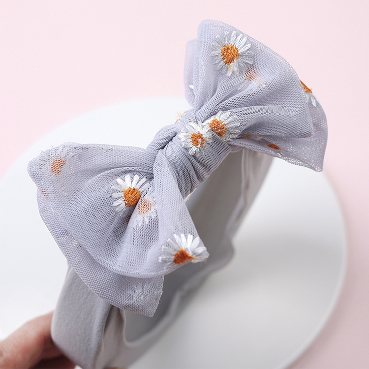 Simple Solid Color Double Bow Children Small Daisy Flower Nylon Headband display picture 5