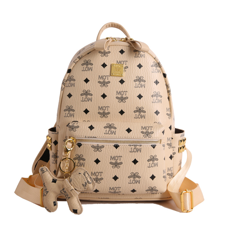 Mochila de moda coreana impresa para mujeres, mochila de clase para estudiantes universitarios, adornos colgantes, mochila de viaje de gran capacidad para mujeres