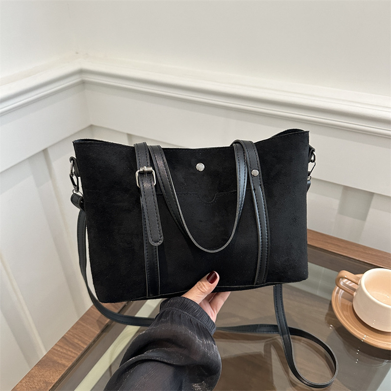 Nueva textura retro bolso de mujer extranjero empalme esmerilado simple mochila de hombro de gran capacidad de transporte