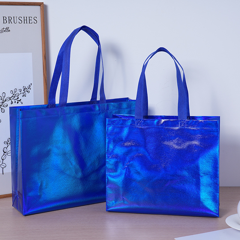 Bolsas de tela no tejida láser coloridas personalizadas logotipo de marca de moda bolsas de zapatos de mujer regalos de compras personalizados