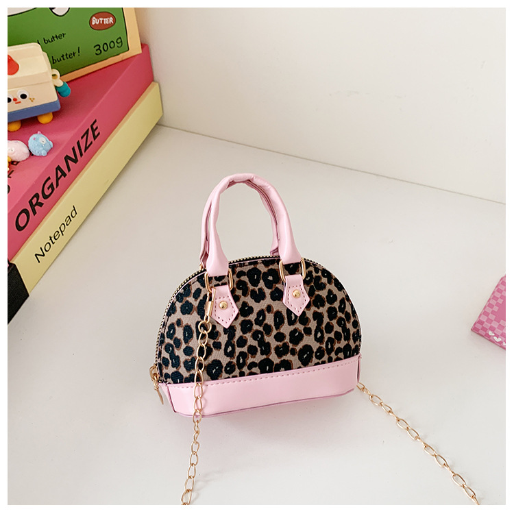 Exquisita y compacta bolsa de niña estampado leopardo extranjero mini bolso de cadena bebé nuevo estilo coreano bolso de conchas para niños