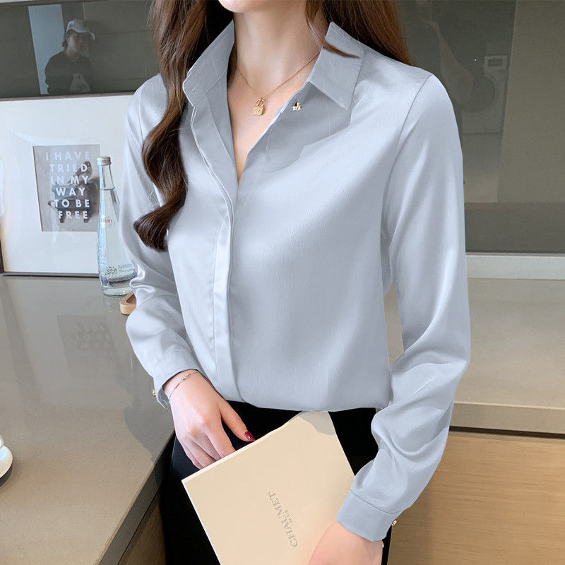 杭州のシルクのシャツの女性の長袖の春秋服の新型の绢糸の上着の白い職業は底のシャツの女性を詰めます。|undefined