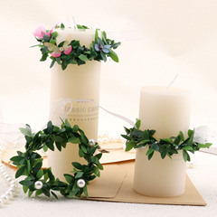 クロスボーダーのクリスマスの花の藤の輪のナプキンの環の針金の緑の葉の花輪のナプキンは緑の藤の条を掛けて台の家庭の装飾を並べます。