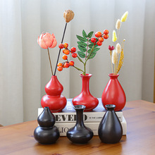 酒店用品陶瓷小花瓶简约黑陶桌面花器会所餐厅刺身日料干冰瓶子