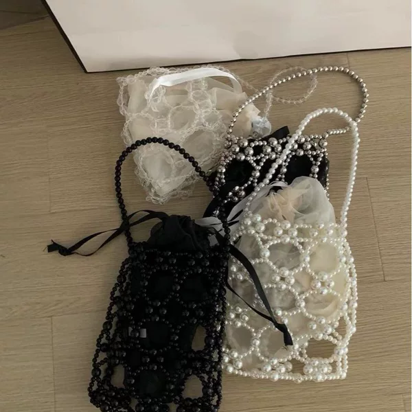 Factory Direct beaded bag handmade woven bag portable niche hollow pearl bag finished mobile phone bag underarm bag