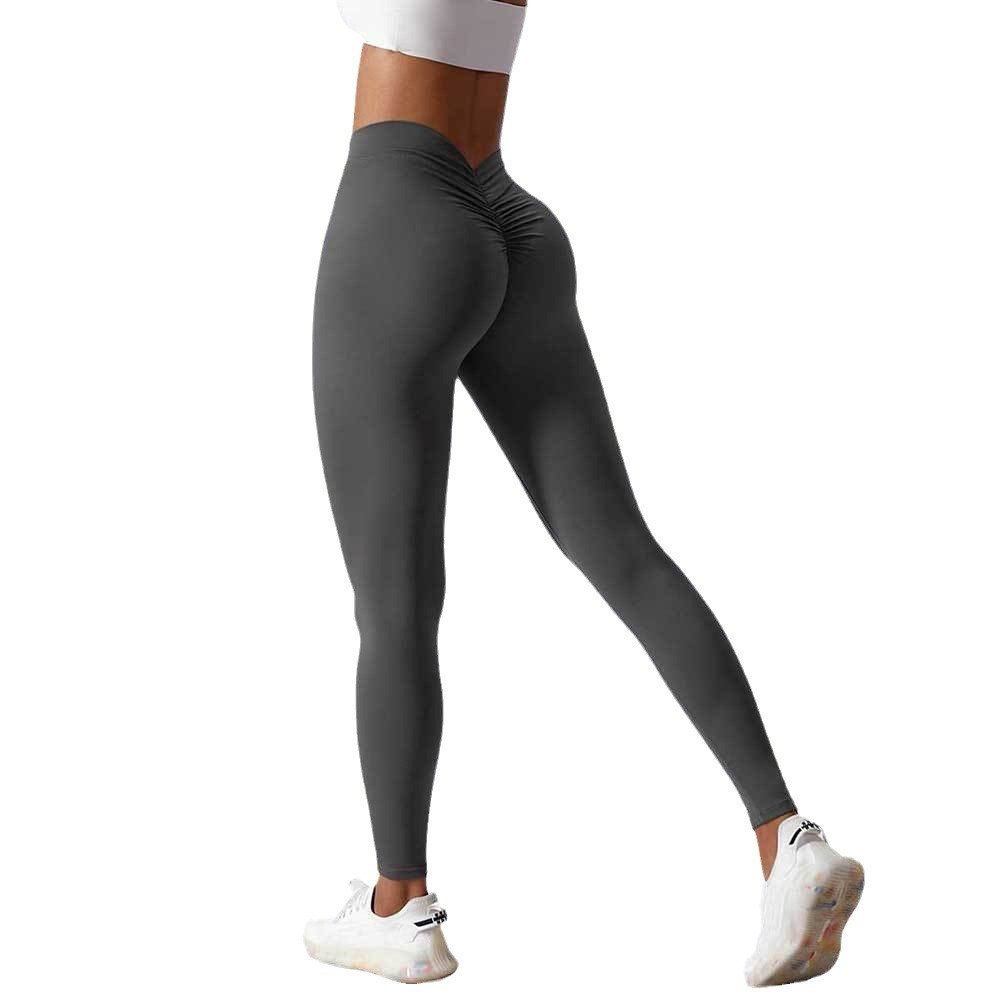 Nuevos productos personalizados de color sólido de la cintura trasera en V arrugada de caderas desnudas de nueve pantalones de alta elasticidad de pantalones de acondicionamiento físico para mujeres