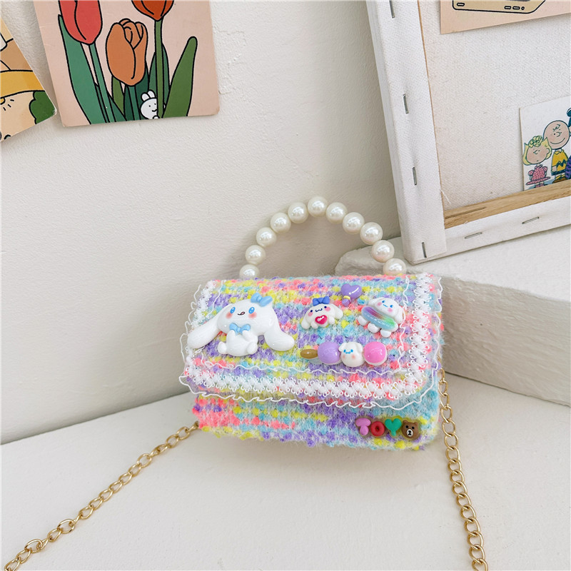 Otoño e Invierno nueva niña monedero dibujos animados lindo accesorios perla bolso versátil estilo occidental bebé bolsa de hombro