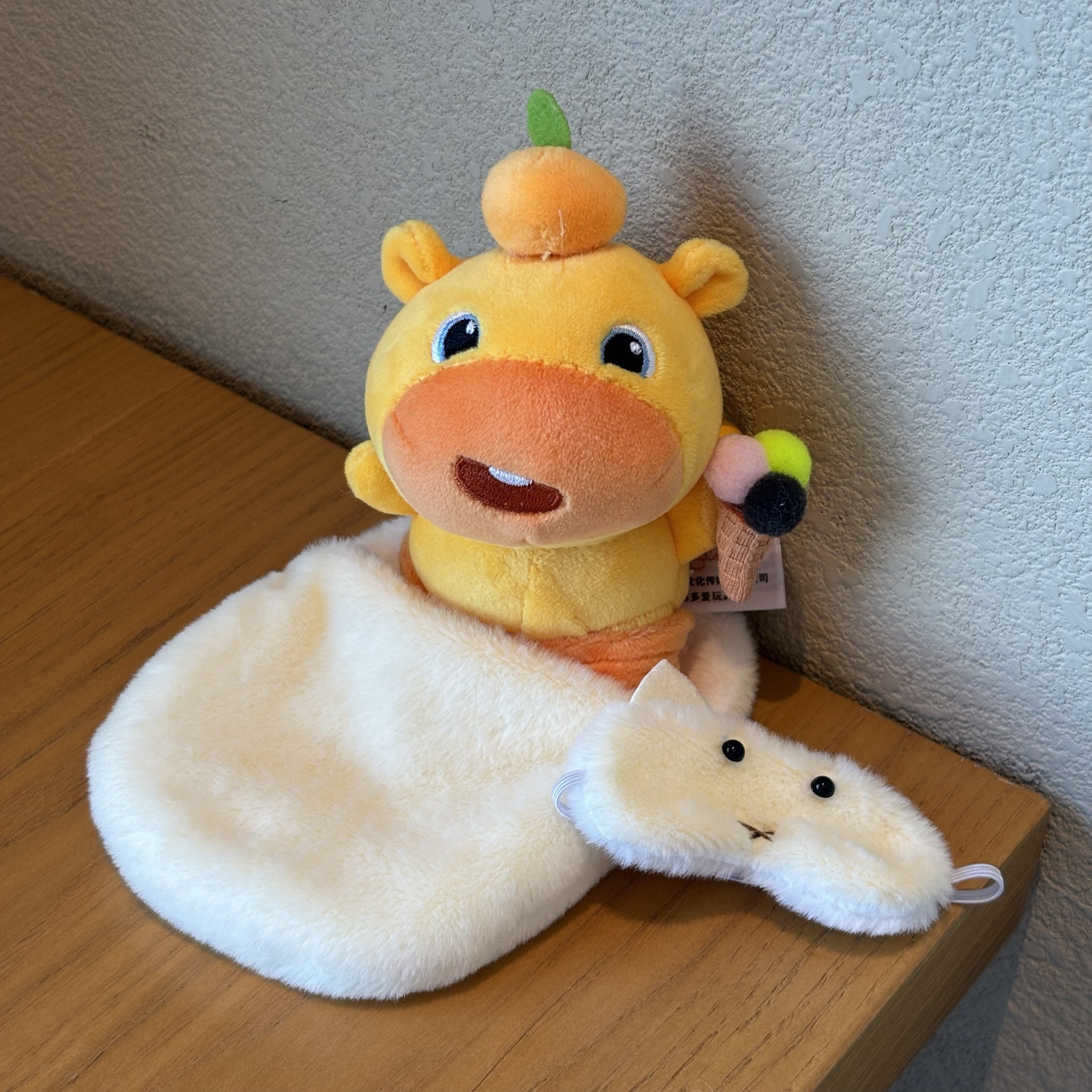 Yellow sleeping bag + eye mask + ice cream