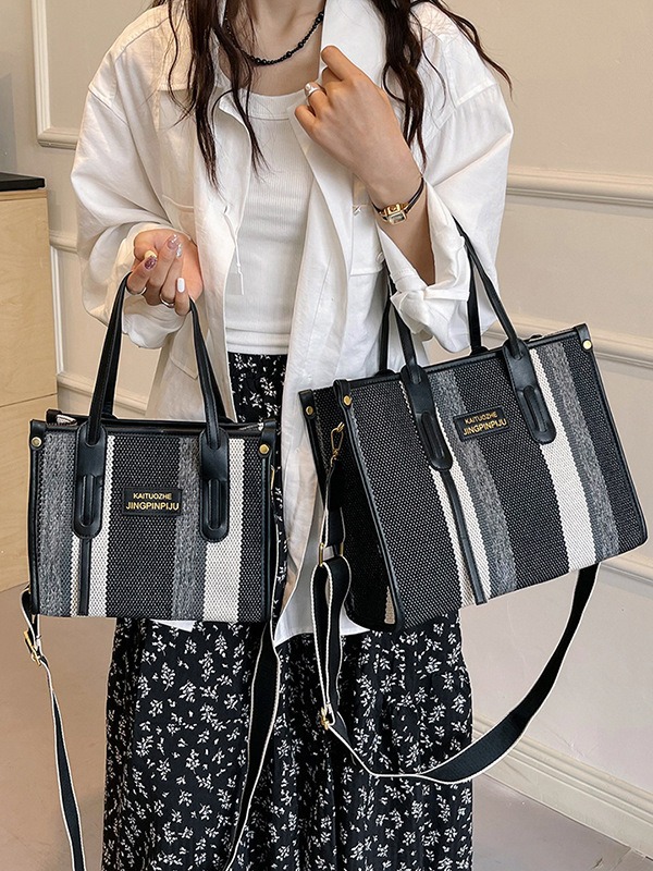 Bolso Tote portátil a rayas de color de contraste de lona para mujer 2024 nueva textura de moda transfronteriza bolso de mensajero de un solo hombro