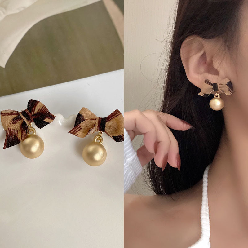 Korean retro earrings leopard print bow earrings autumn and winter fabric earringspicture2