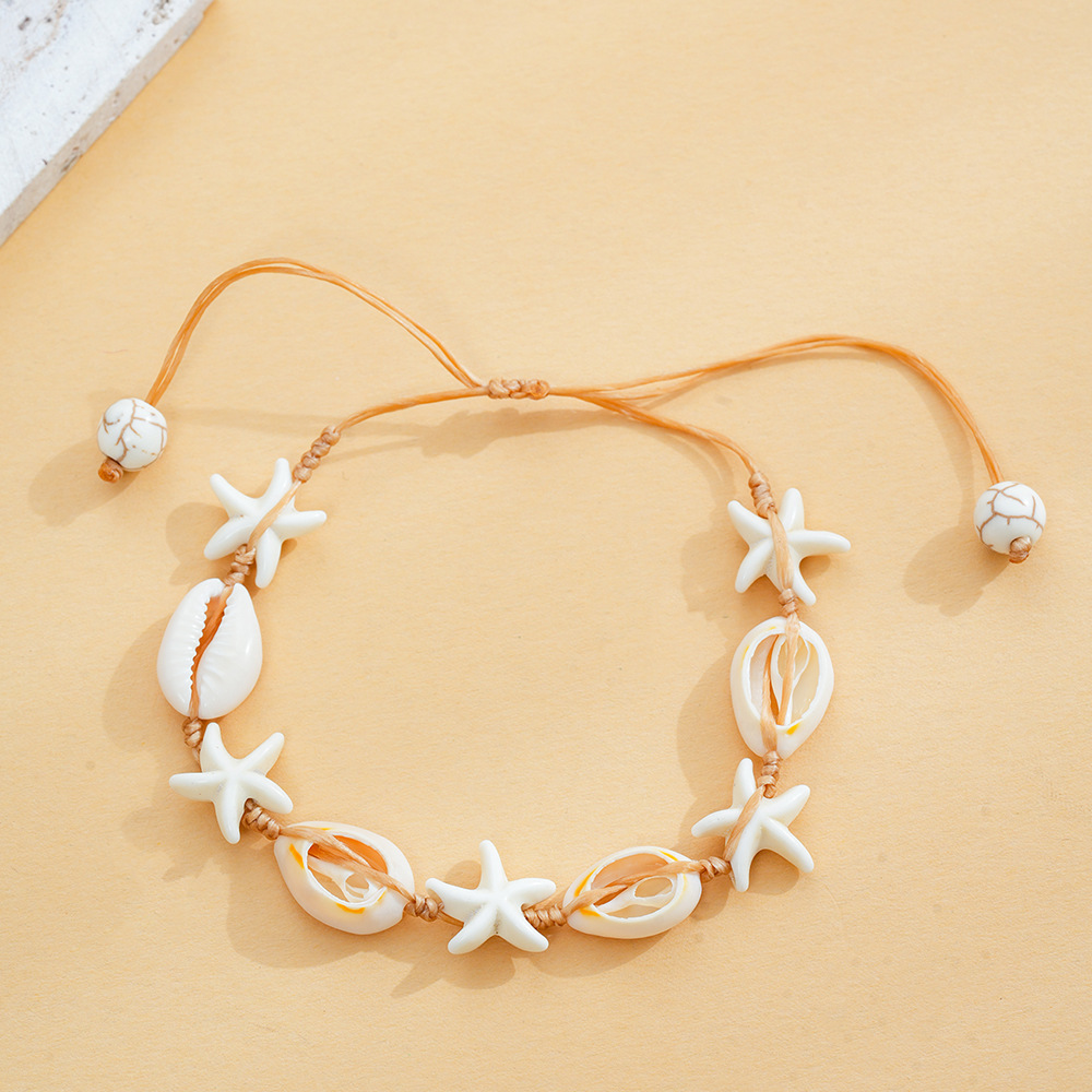 Europa y América playa viento marino tejido a mano pulsera conchas de estrellas de mar nicho simple estilo versátil personalidad