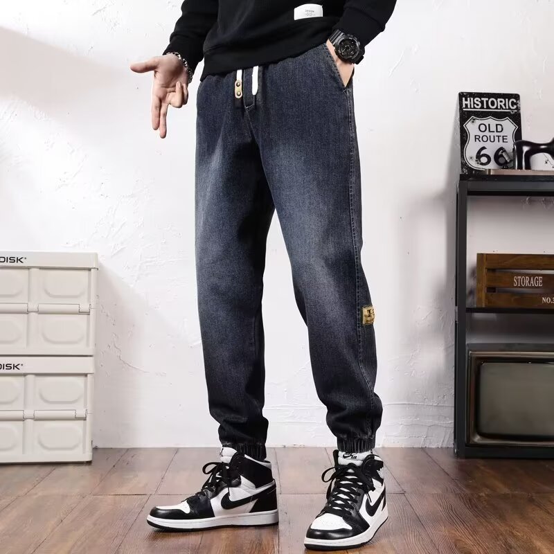 2024 primavera y otoño pantalones vaqueros de cintura elástica todo fósforo para hombres, pantalones de pierna ancha rectos sueltos para adolescentes de la calle principal