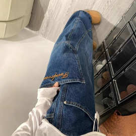 美式复古蓝色工装弯刀牛仔裤女春夏新款高腰直筒宽松垂感大阔腿裤