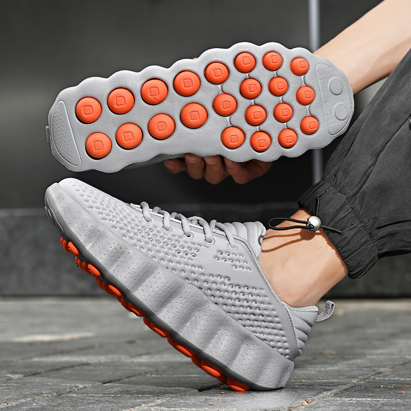 Zapatos deportivos huecos para hombres y mujeres, zapatos de malla de masaje, nuevos zapatos antideslizantes para parejas, zapatos de carrera casuales.