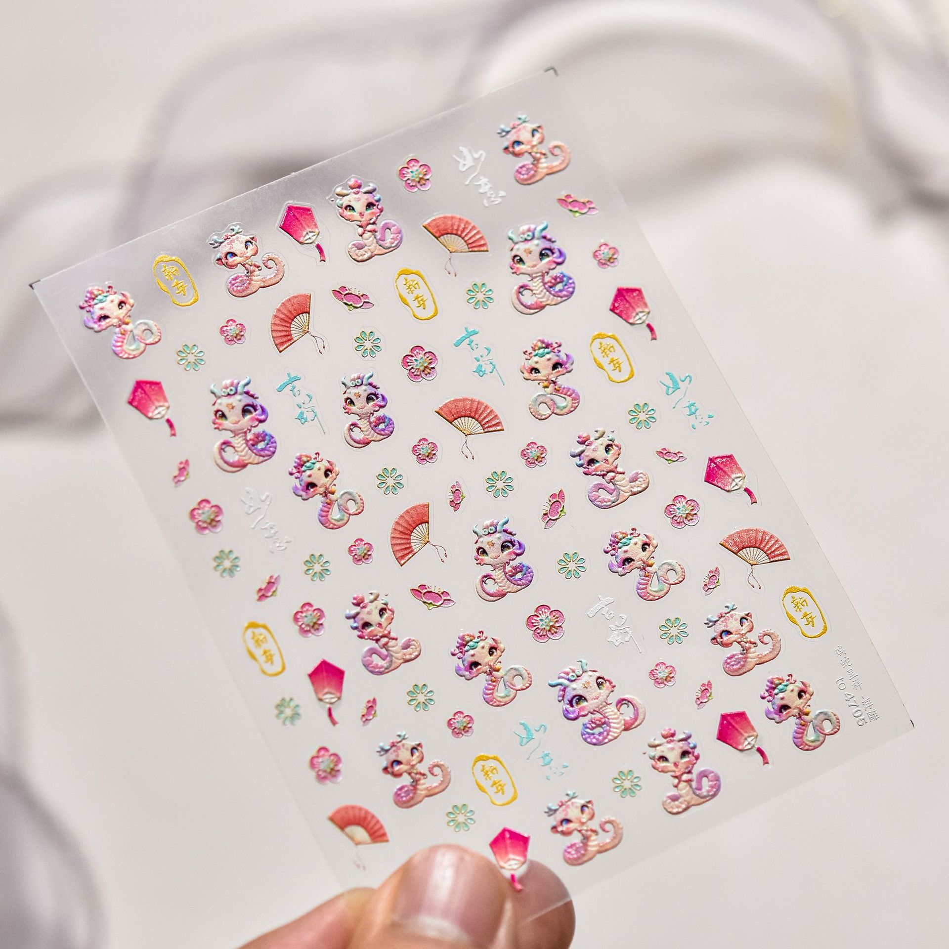 Manicure nuevo pegatinas en relieve en la explosión japonesa pegatinas de uñas para niños Rui Serpente Chengxiang pegatinas de uñas al por mayor